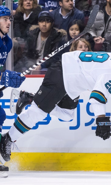 Kane scores twice, Sharks rout Canucks 7-2